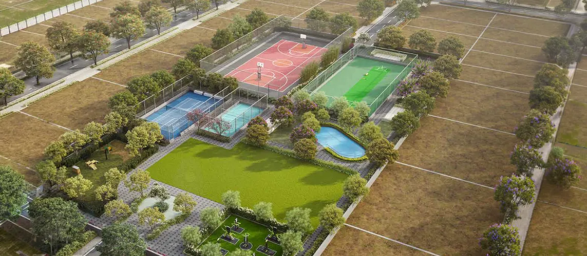 Aerial view of the plotted layout with sports courts and open greens at Birla Mrida Plots in Boisar